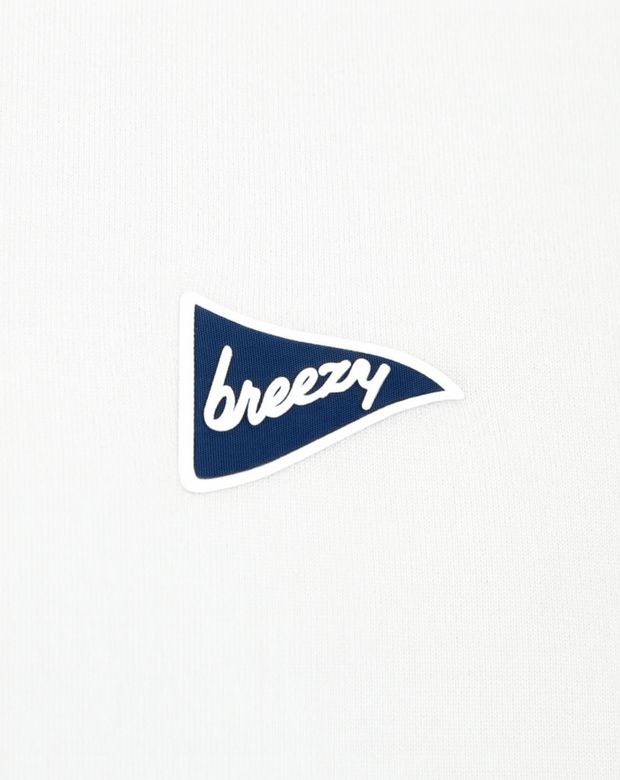 Breezy Golf logo detail in blue on white hoodie fabric, minimalist close-up