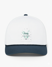 TravisMathew Beer Break Hat in white with navy brim and rope detail, featuring a ‘Party All Night’ cocktail graphic patch on the front panel.