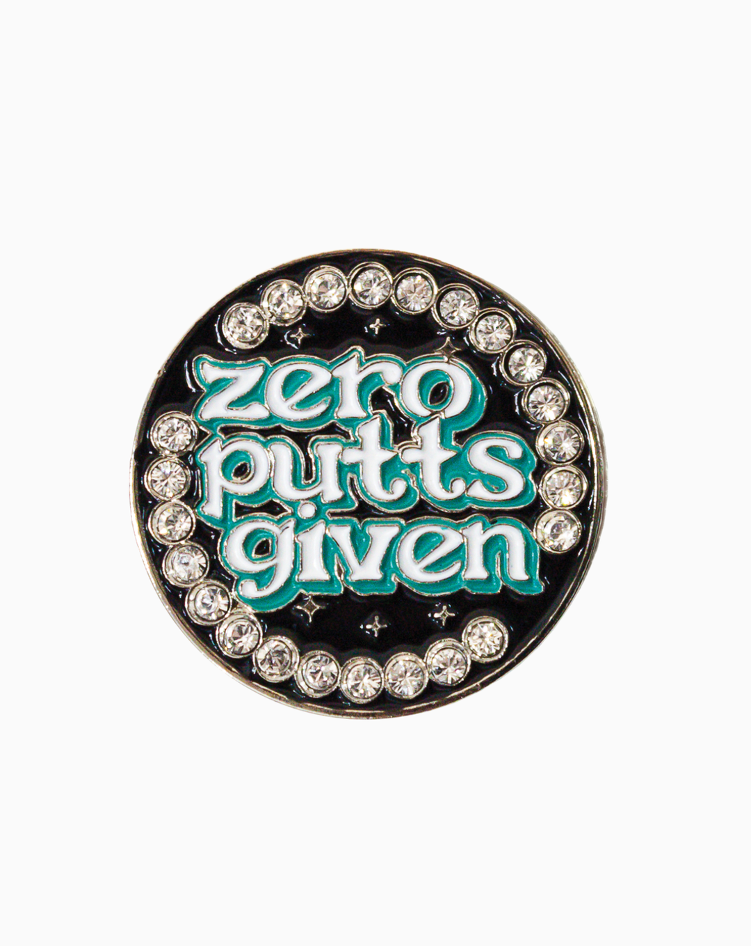 Round golf ball marker featuring the text 'Zero Putts Given' in teal lettering, surrounded by sparkling Swarovski crystals on a glossy black background.