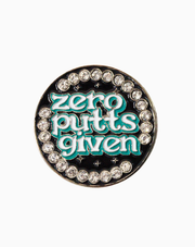 Round golf ball marker featuring the text 'Zero Putts Given' in teal lettering, surrounded by sparkling Swarovski crystals on a glossy black background.